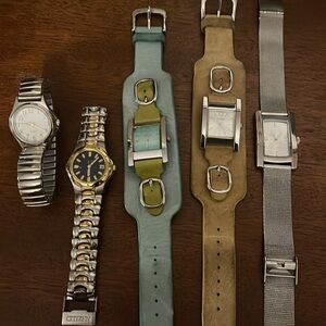 Lot of 5 watches includingg Citizen, Guess, and Skagen.